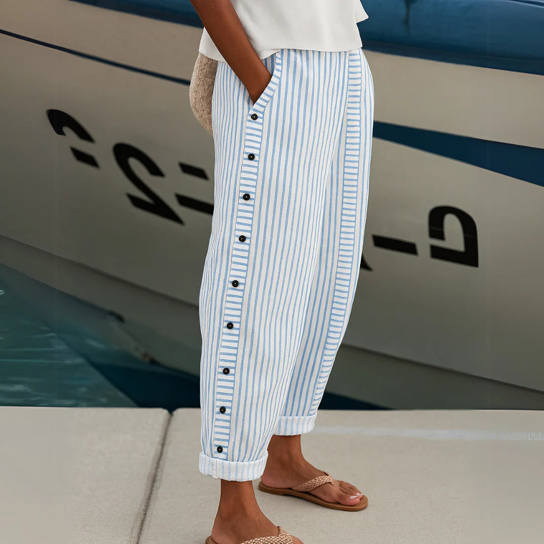Elegantes pantalones a rayas con botones